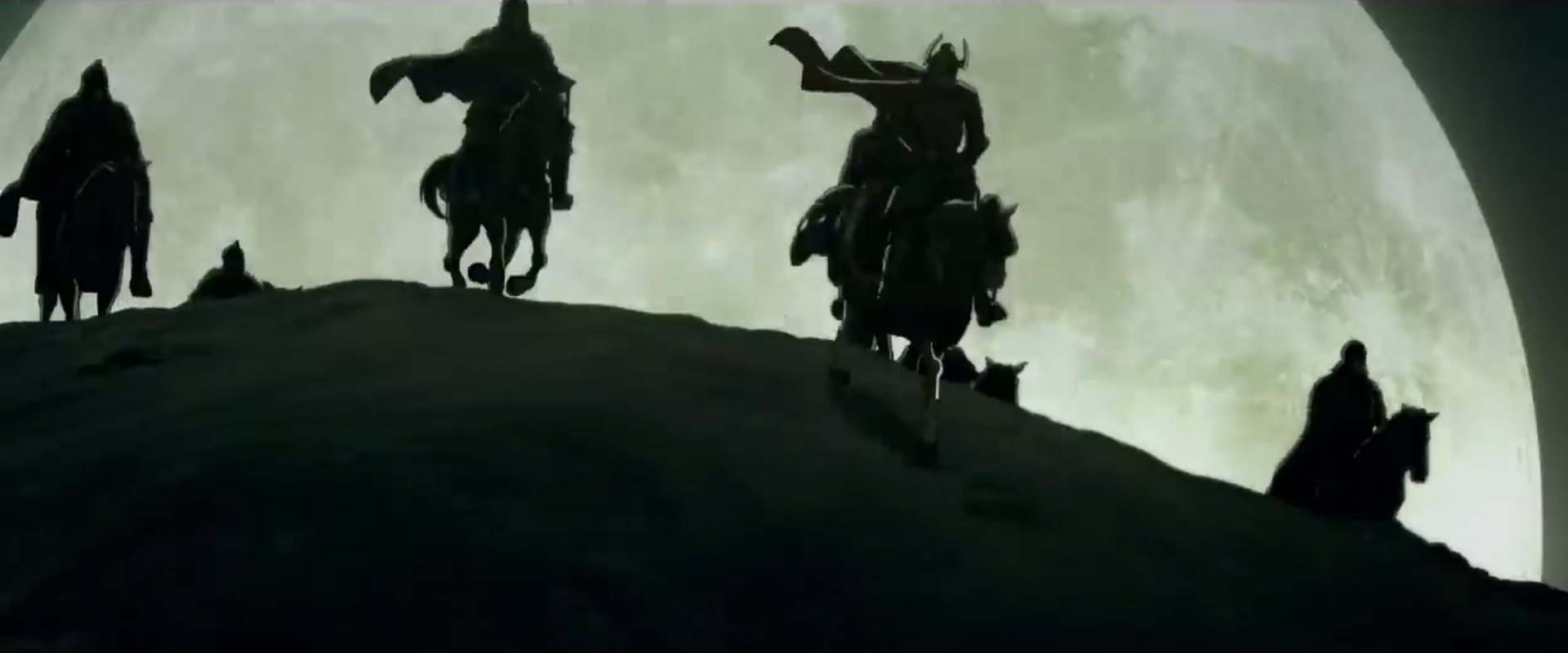 With the full moon behind them, Helm and his riders gallop over the crest of a hill in The War of the Rohirrim.