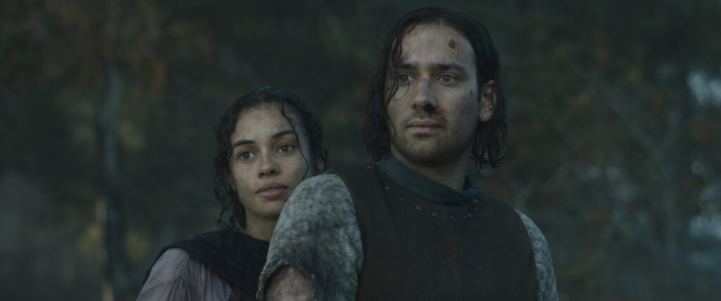 Isildur looking pensive with Estrid standing behind him