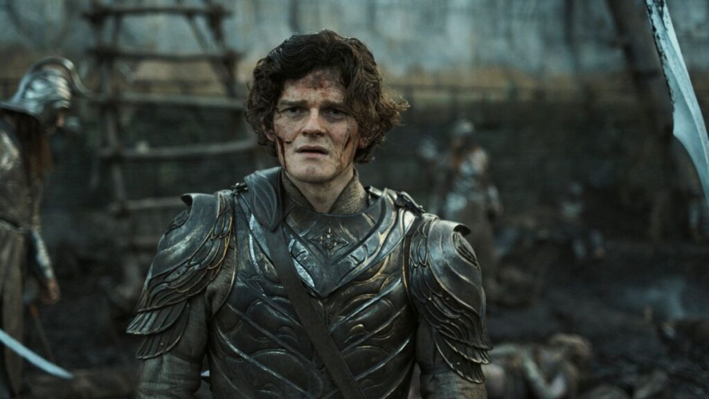 A dirtied and distressed Elrond at the siege of Eregion with tousled curly hair