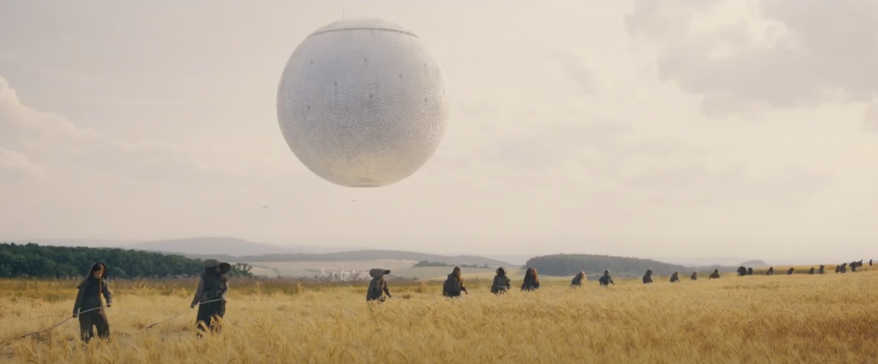 A floating orb hovers over a field of grain in Season 3 of The Wheel of Time