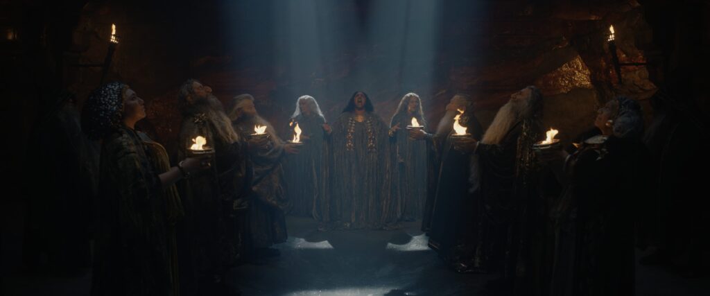 Disa leads the ritual act of stone-singing