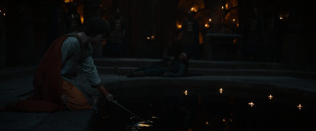 Kemen washes his sword of Valandil's blood