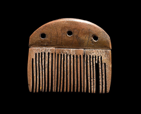 The Vimose comb, with scratched runic letters on the grip