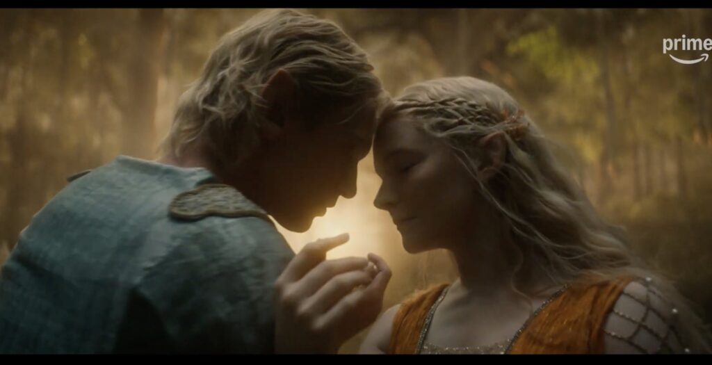 Still head and shoulders shot of Galadriel and Celeborn dancing with their foreheads touching