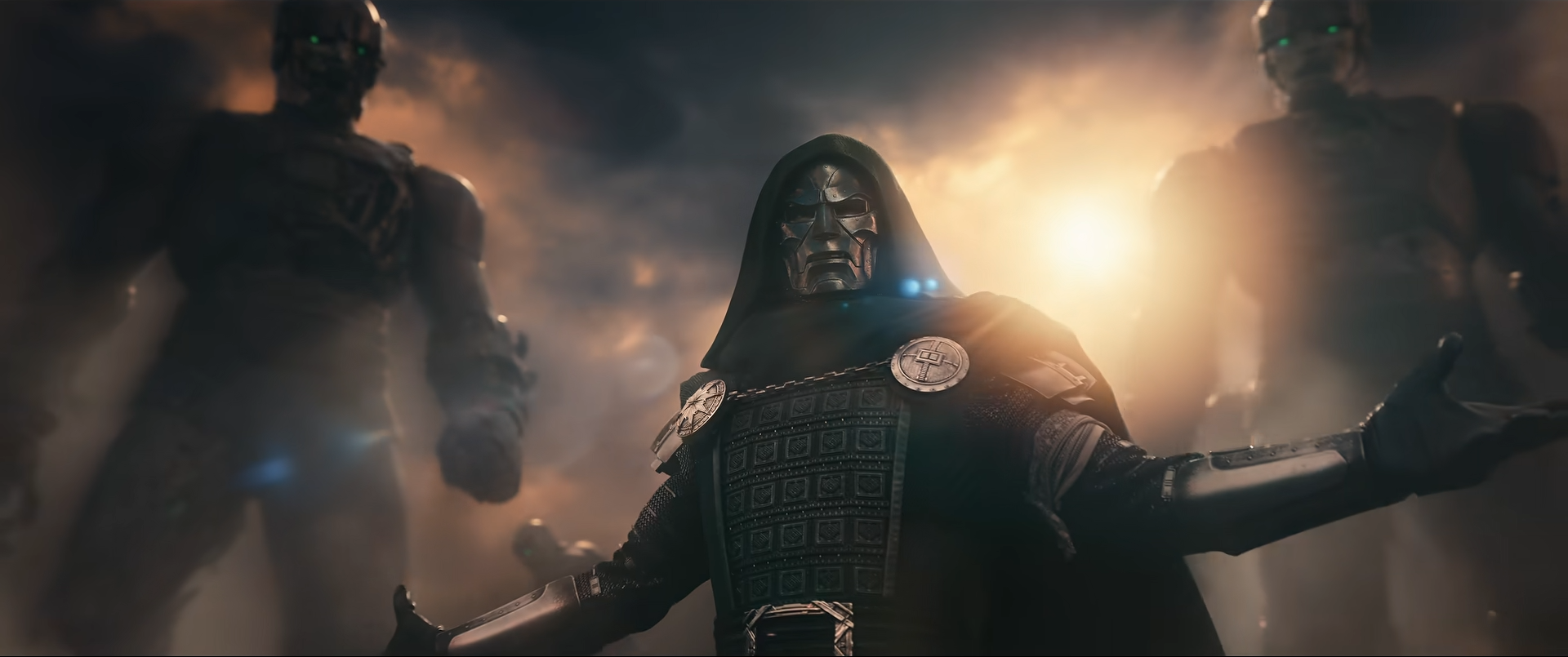 An armoured Dr Doom backed by what look like two large humanoid robotic figures