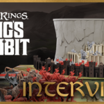 YouTube thumbnail showing the game title "The Lord of the Rings: King's Gambit" and the word "interview". The image shows the game board set up