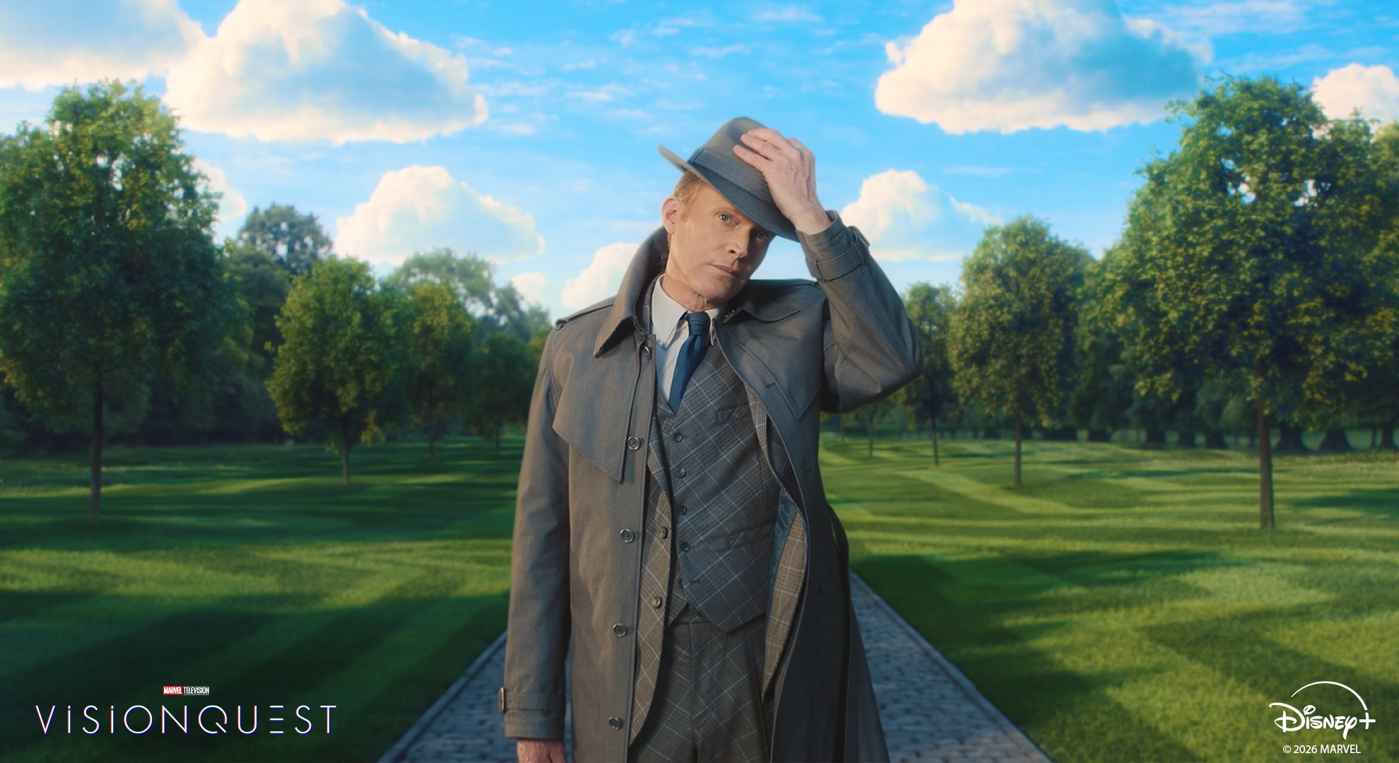 Centered shot of Vision in the garden of his mind palace, just about to take off his brimmed hat