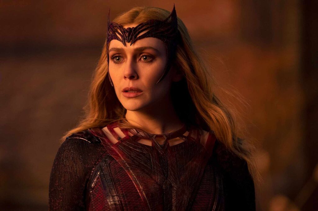 Wanda Maximoff as the Scarlet Witch looking slightly shocked.